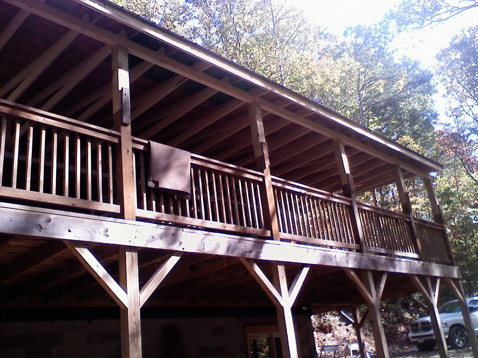 Timber framing under a new elevated porch and deck — Roof Leak Repair in College Springs by Roofing Brothers
